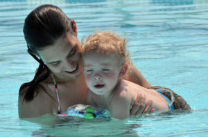 mother and child in a pool