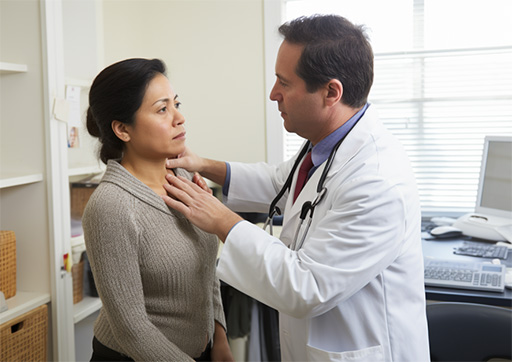 doctor performing a physical exam