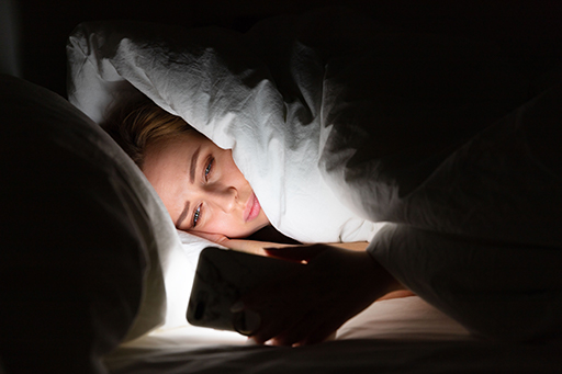 womans melatonin hormone affected using cellphone in bed