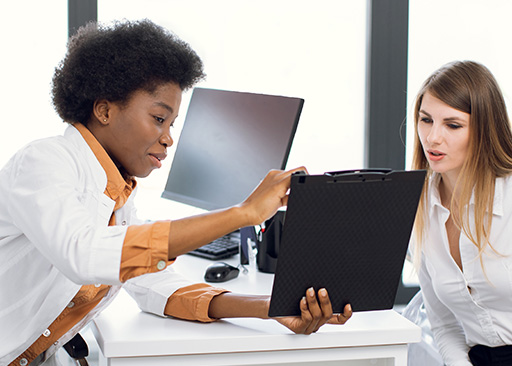 african american doctor interacting patient engagement in healthcare with lady