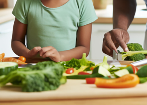 kid helping parent prepare healthy meal