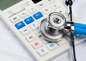 picture of stethoscope and calculator representing cost custing strategies