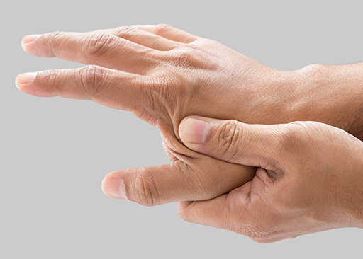 white male grabbing hand wanting neuropathy pain relief