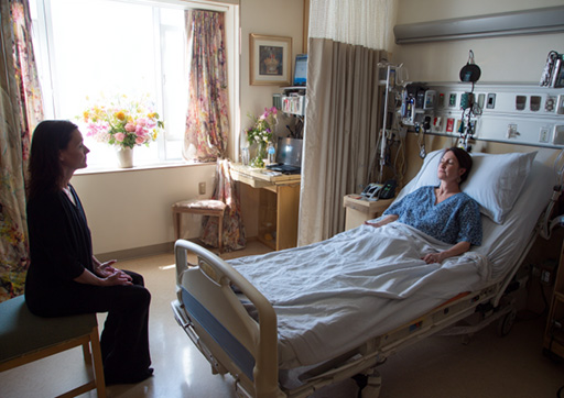 hospital room with a Reiki practitioner