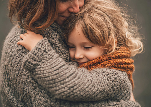 parent comforting a child