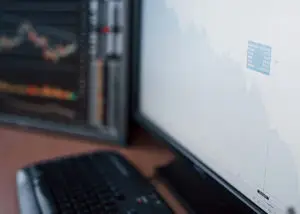 clinical informatics reviewing health trends on computer screen