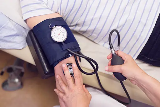 doctor measuring blood pressure