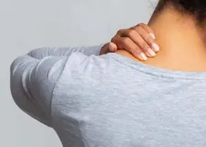 lady experiencing body tension in her neck