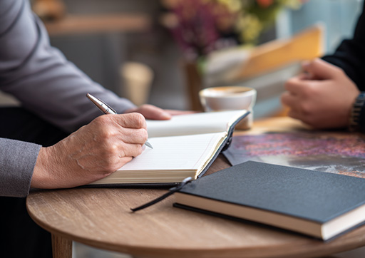 person discussing lifestyle factors with another