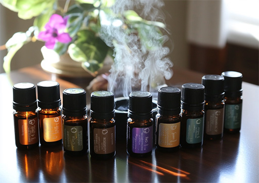 essential oil bottles near diffuser