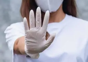 nurse holding her hand up preferring non pharmacological pain management