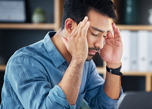 person with migraine headache