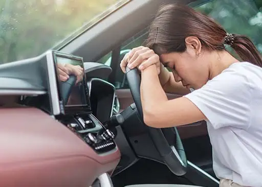 young asian lady experiencing adrenal fatigue