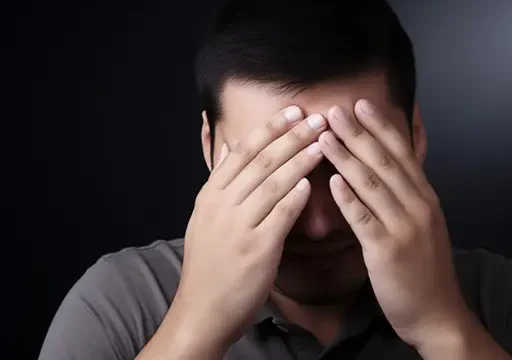 person experiencing persistent nausea