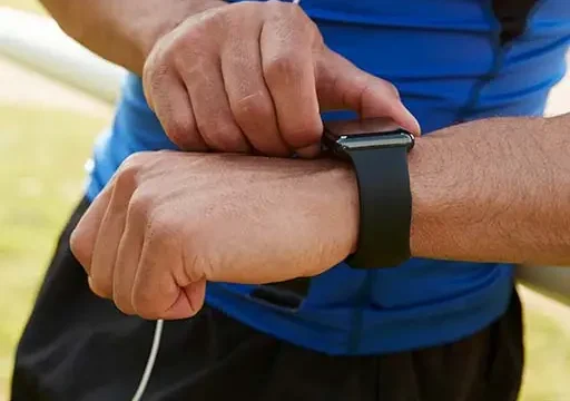 male checking galvanic skin response sensor reading on smartwatch